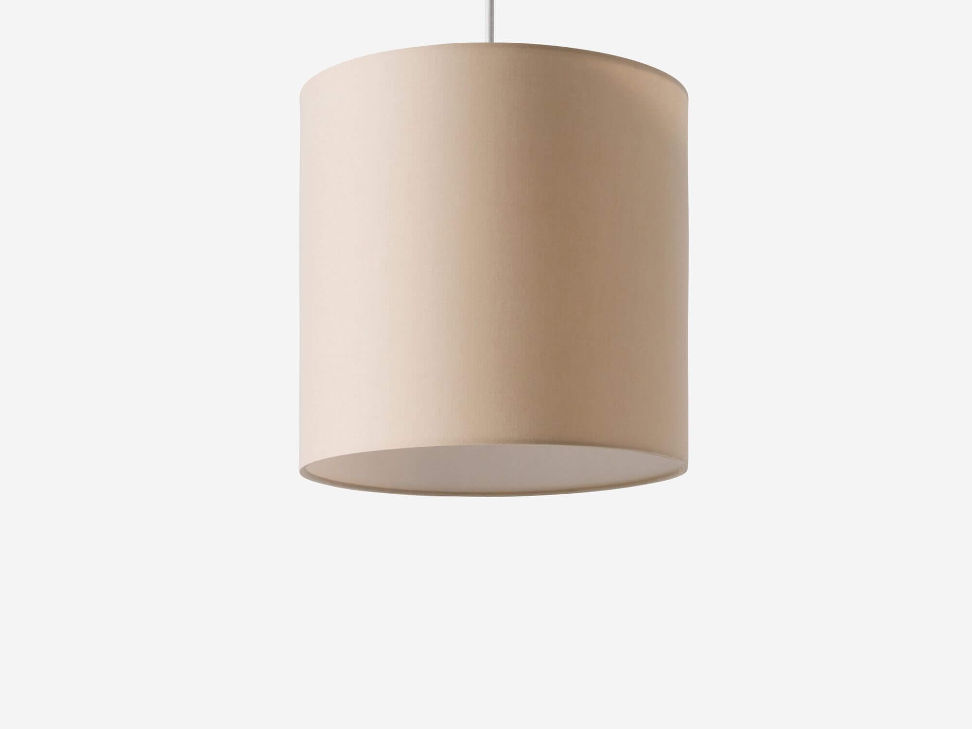 Detail view of beige pendant shade with light off